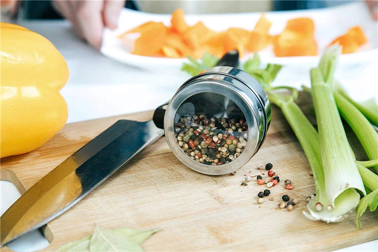 Magnetic stainless steel spice jar set from Showlu Smart General, featuring sleek kitchen storage with clear labels and magnetic lids.