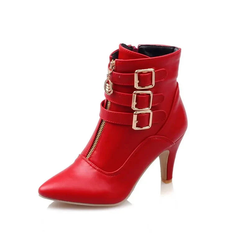 Black women's pointed toe Chelsea ankle boots with high heels, buckle detail, and side zipper from SHOWLU FASHION STORE.