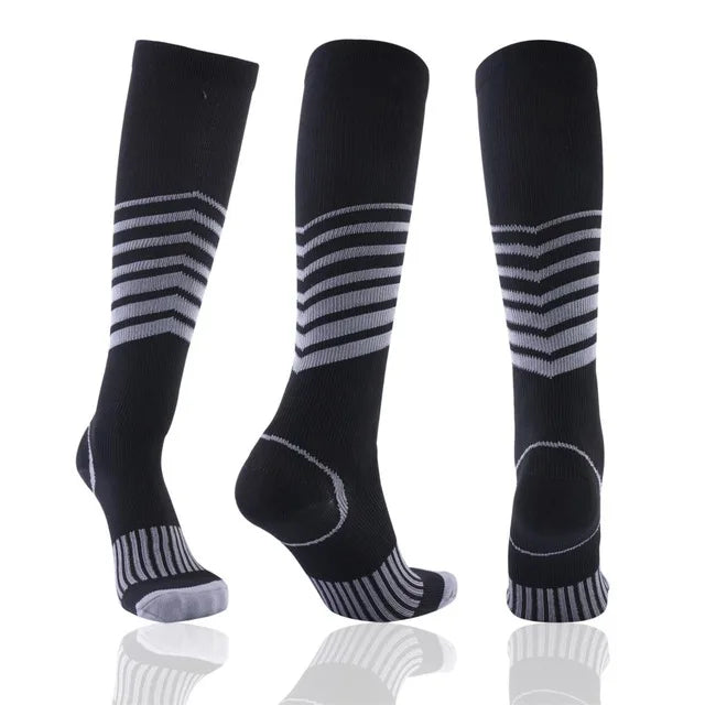 Black compression socks for men and women by Showlu Fashion Store, designed for football, sports, and fatigue relief.