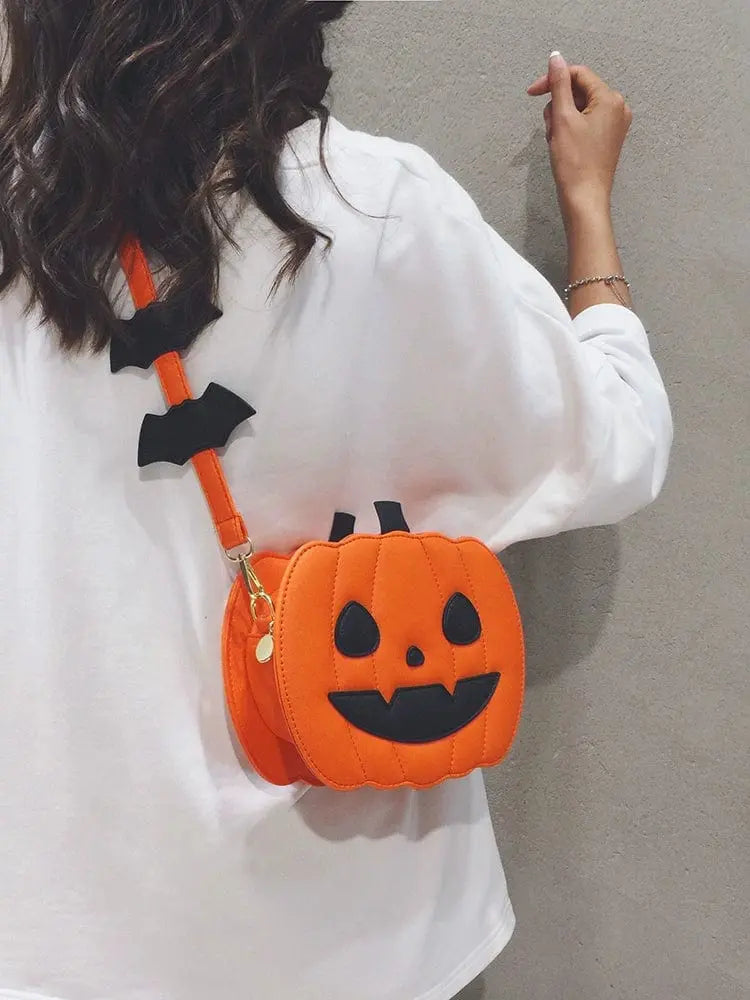 Linglan Halloween Pumpkin shoulder bag by Showlu Fashion Store, made of PU leather, featuring a fun, versatile crossbody design for women.