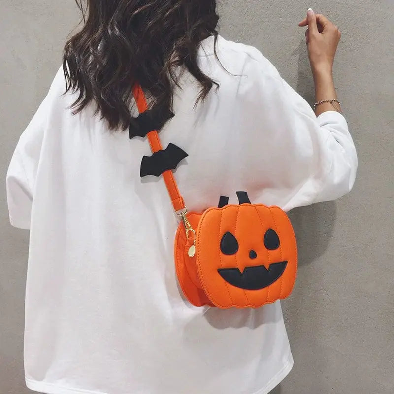Linglan Halloween pumpkin shoulder bag for women, PU leather crossbody pouch with fun, festive Halloween design by Showlu Fashion.