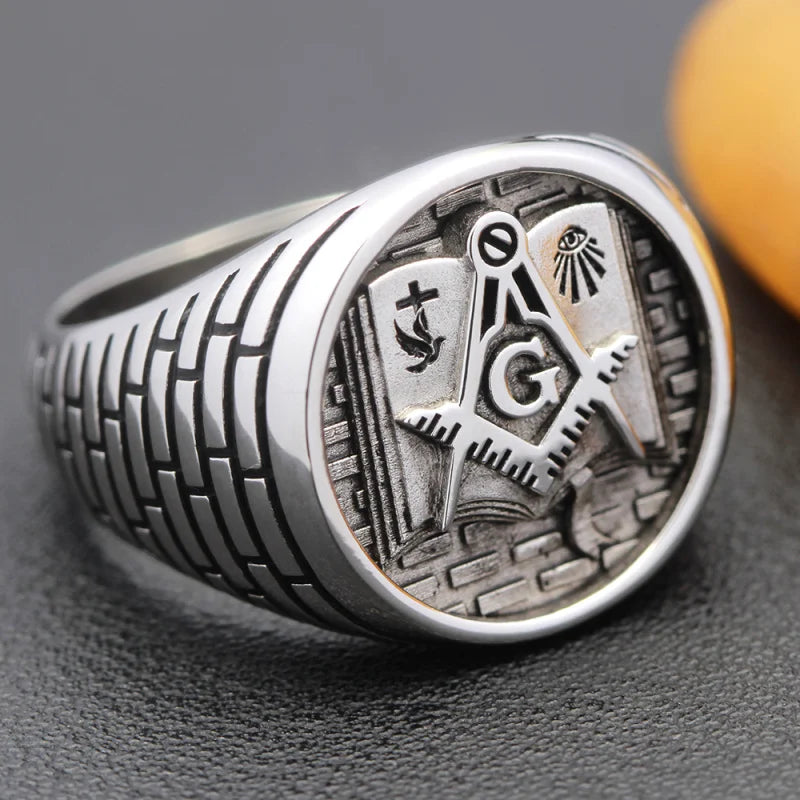 Sterling silver Masonic ring with Holy Bible design for men and women, featuring intricate Freemason symbols and craftsmanship.