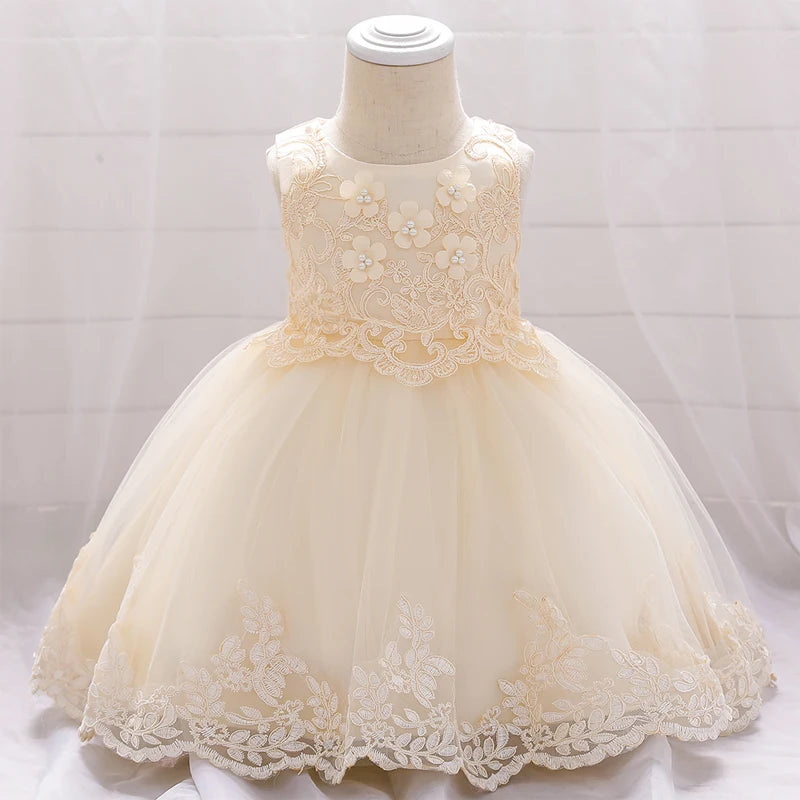 Baby girl white tulle flower dress by Showlu Fashion Store, perfect for baptism or first birthday celebrations, featuring delicate floral details.