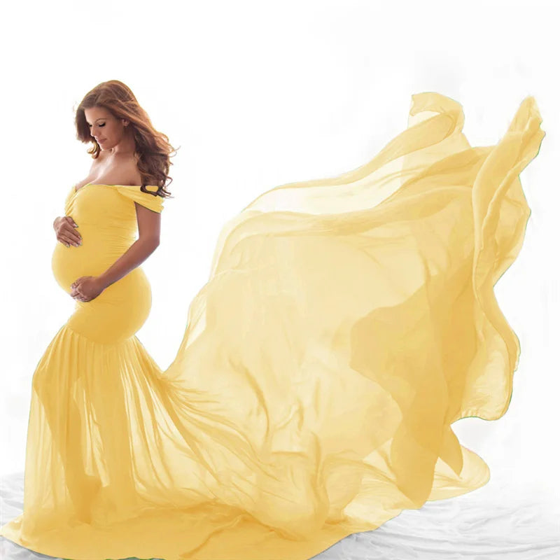 Elegant white lace maternity gown for pregnant women, long sleeve maxi dress ideal for pregnancy photoshoots and special occasions.