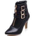 Showlu Fashion YBQJOO women's pointed toe Chelsea ankle boots with high heels, buckle accents, and side zipper detail.