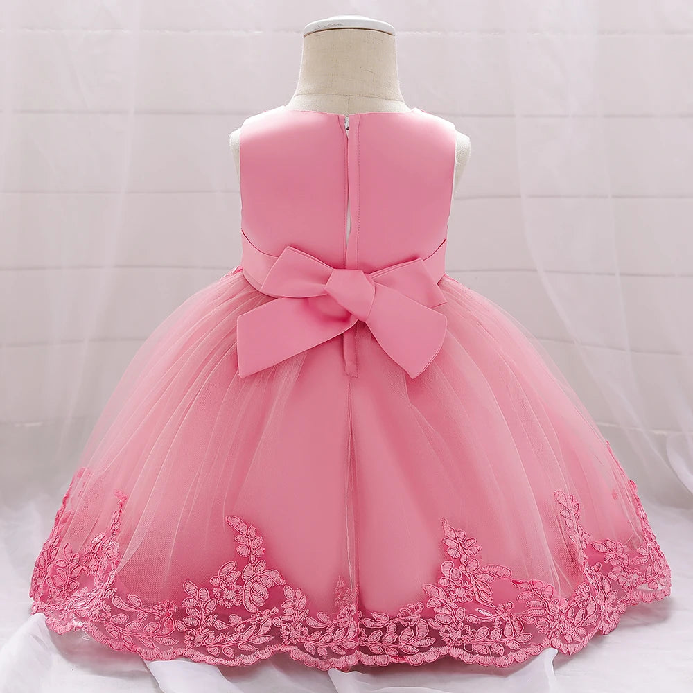 Baby girl white tulle flower dress by Showlu Fashion Store, perfect for baptism or first birthday celebrations.