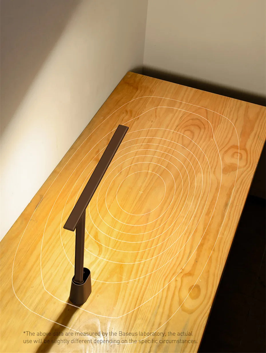 Rechargeable Baseus Smart Desk Lamp with adjustable arm and warm LED light, ideal for reading and workspace illumination.