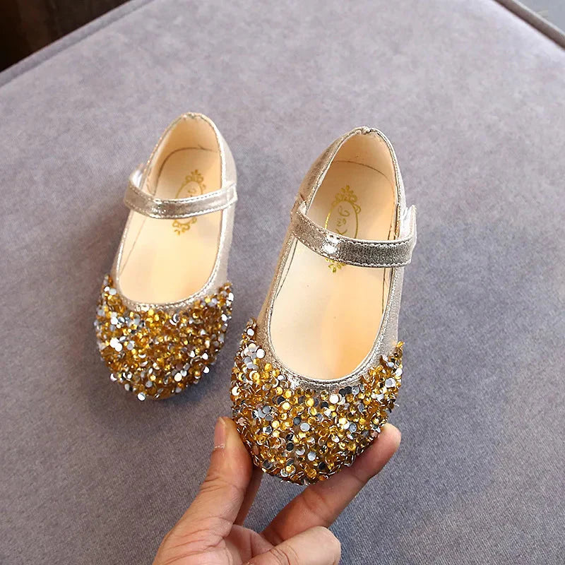 KushyShoo girls glitter princess toddler flat dance sandals with colorful straps and sparkling embellishments, perfect for special occasions.