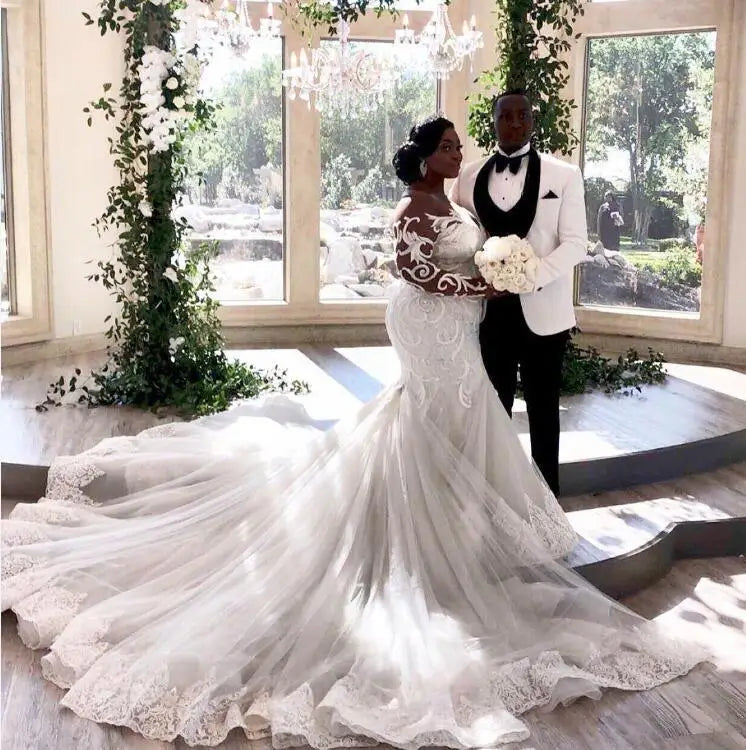 Showlu Fashion Plus Size Mermaid Wedding Dress with lace long sleeves and intricate details, perfect for bridal occasions.