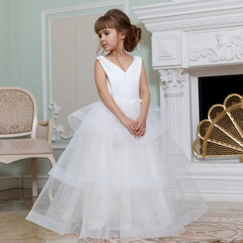 White flower girl dress by Showlu Fashion with lace applique, beaded details, perfect for First Communion or special occasions.