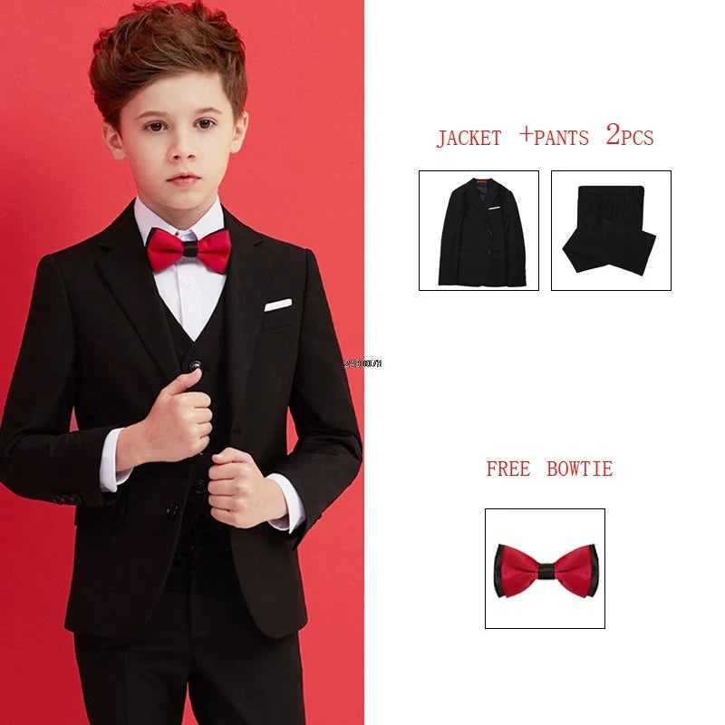 Kids boys black 007 wedding suit by SHOWLU FASHION STORE, including blazer, vest, shirt, pants, and tie in a formal 5-piece set.