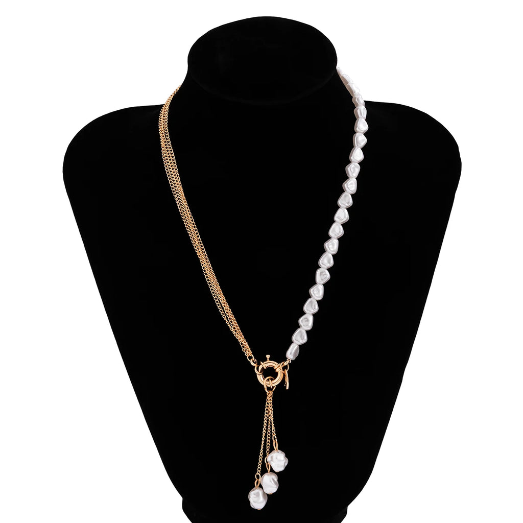 Long tassel pendant necklace with simulated baroque pearls and beaded link chain, stylish lariat jewelry for women.