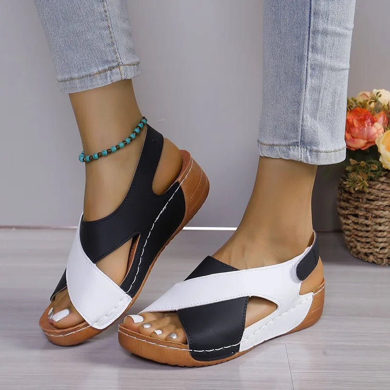 SHOWLU Women's cowhide leather wedge sandals with open toe design, stylish summer shoes, showcasing the leather straps and wedge heel.