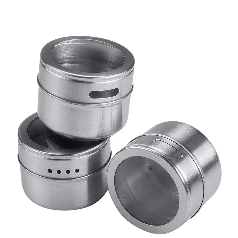 Set of magnetic stainless steel spice jars from Showlu Smart General for kitchen storage with clear lids and secure mounting.