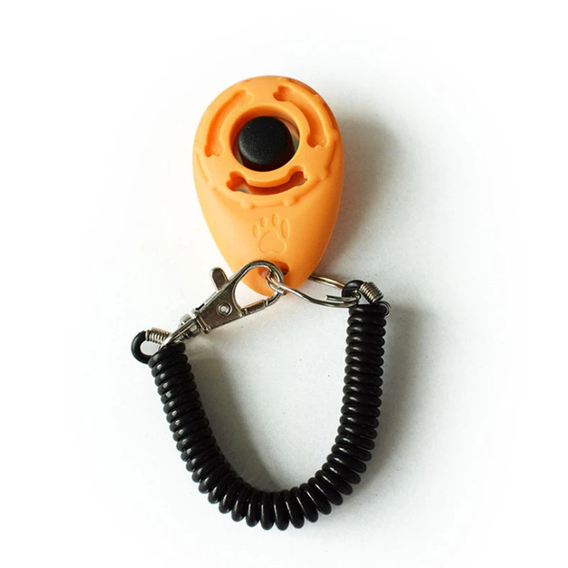 Showlu Smart General pet training clicker with a sleek plastic design, used for positive reinforcement training.