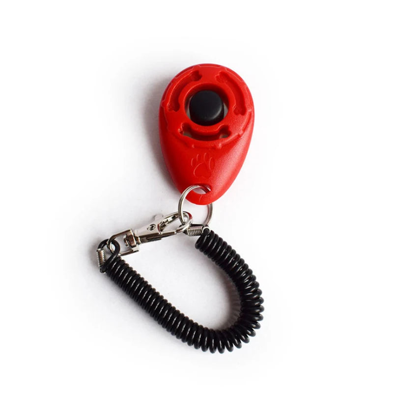 Showlu Smart General Pet Training Clicker, handheld device with a metal button for positive training and behavior reinforcement.