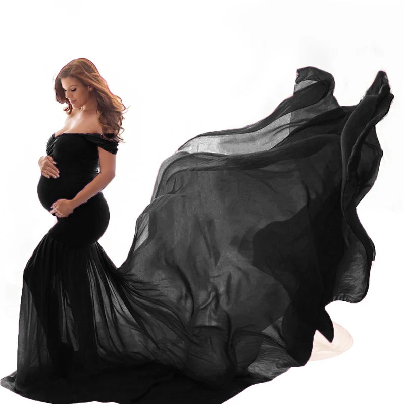 Elegant white lace maternity gown for pregnant women, long sleeve maxi dress, perfect for pregnancy photoshoots.
