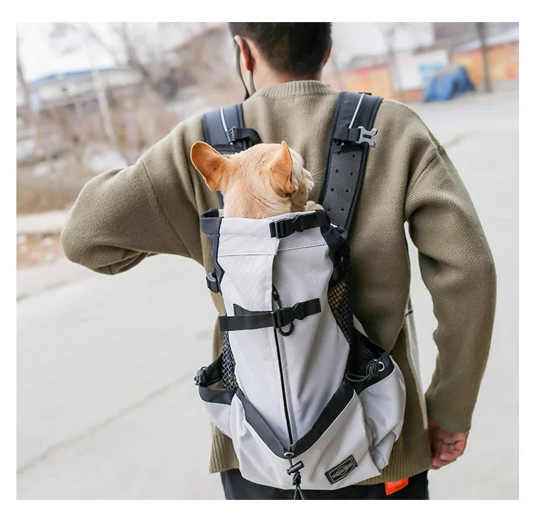 Showlu Fashion Store Petguider breathable nylon dog carrier backpack for hiking and travel, with mesh ventilation and adjustable straps.