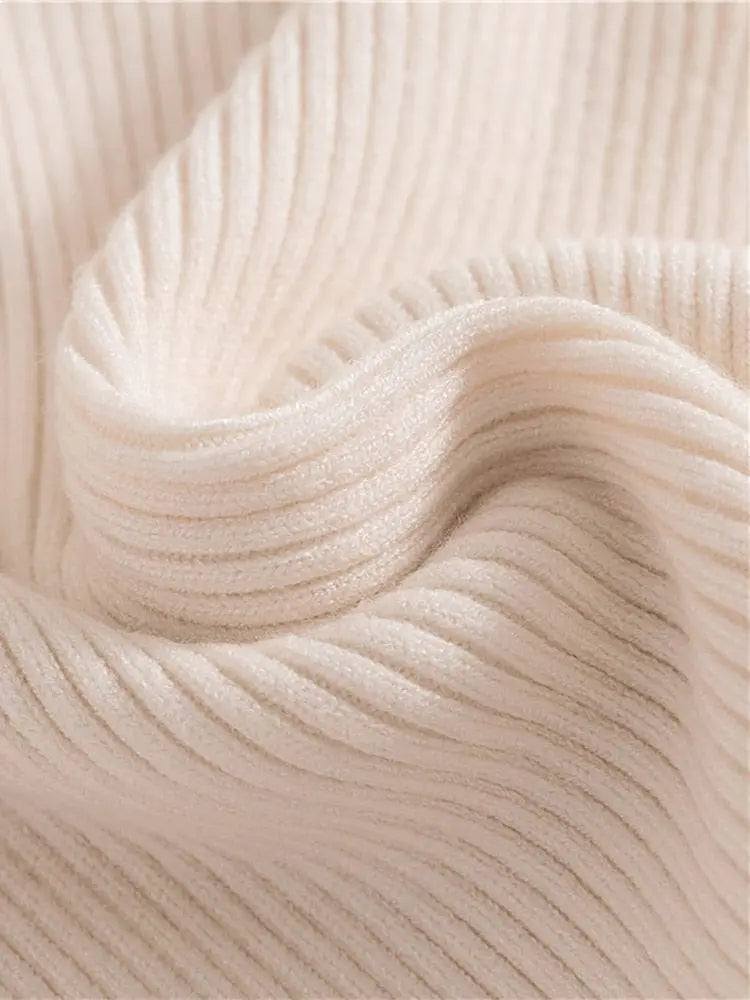 Heliar women's slim fit turtleneck sweater in soft cashmere knit, cozy autumn-winter pullover for women.
