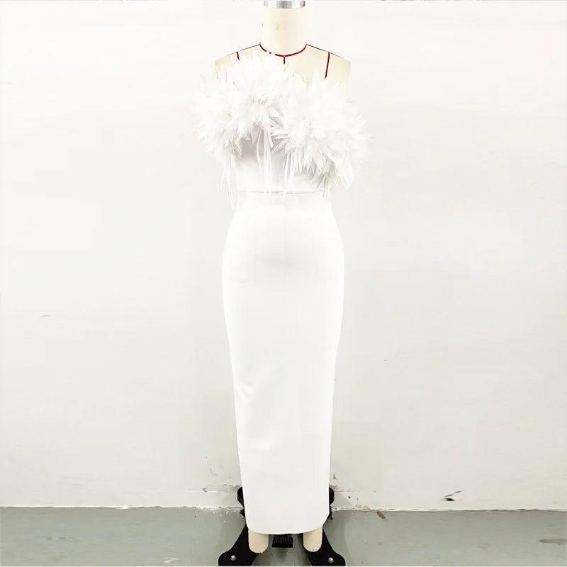 White 3D flower maxi dress by Showlu Fashion featuring a slim, elegant mermaid gown silhouette with intricate floral details.