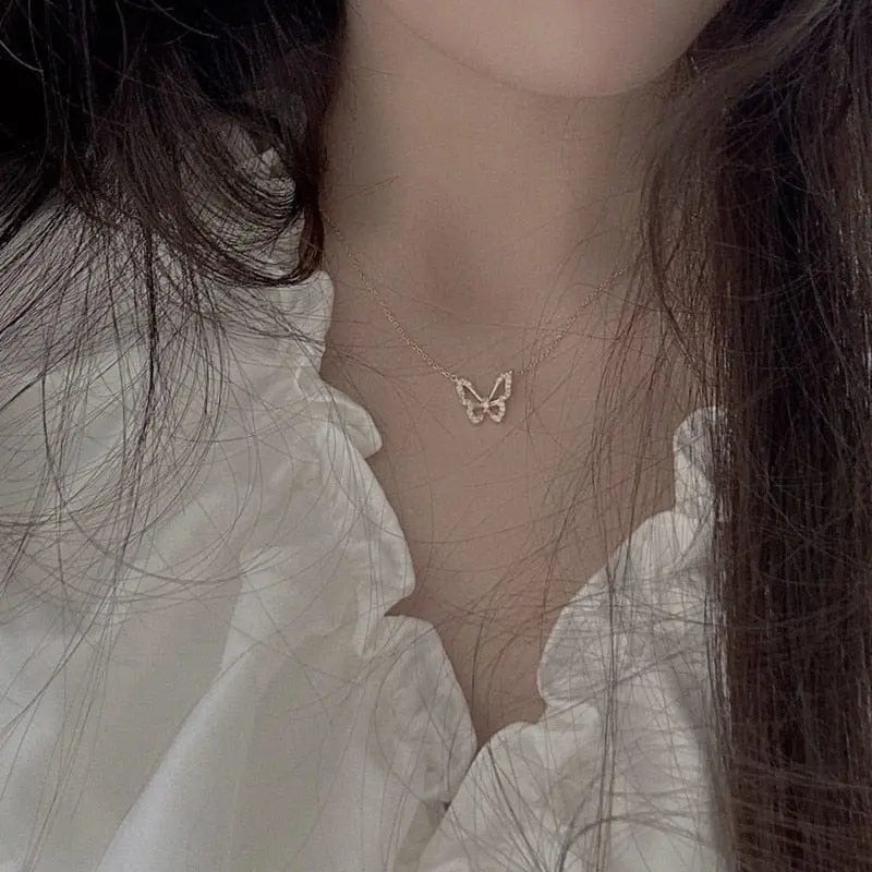 Hollow butterfly pendant necklace with zircon crystals, showing a shiny animal choker design, ideal for fashion and gift-giving.