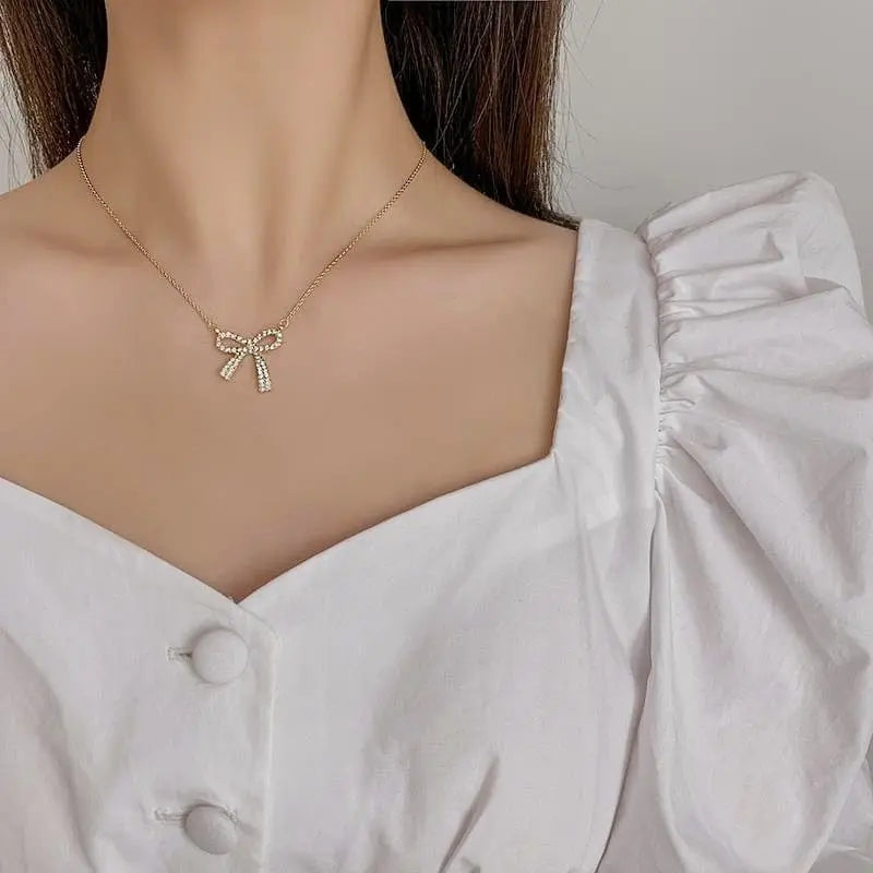 Showlu Hollow Butterfly Pendant Necklace with sparkling zircon crystals, stylish animal choker jewelry for ladies.