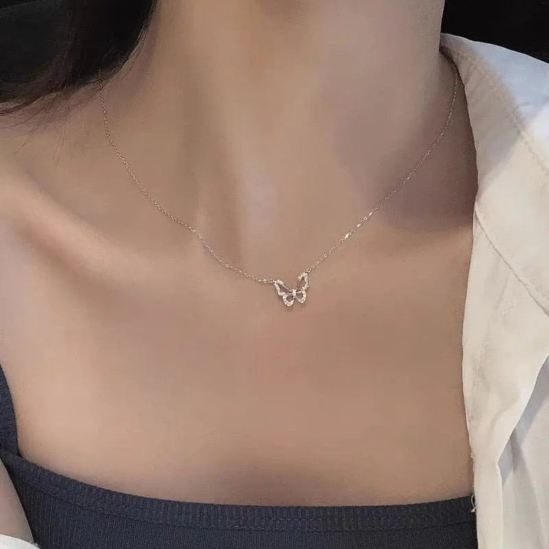 Hollow butterfly pendant necklace with zircon crystals, showing a shining animal choker design, ideal for fashion and party wear.