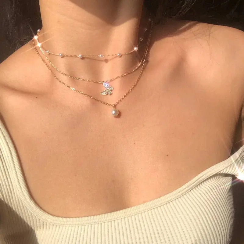 Showlu Hollow Butterfly Pendant Necklace with zircon crystals, a shining animal choker jewelry piece for women and special occasions.