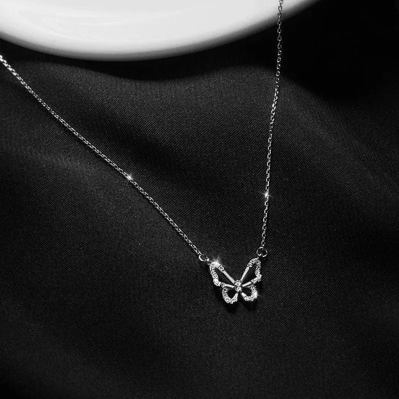 Hollow butterfly pendant necklace with zircon crystals, showing a shiny animal choker design, ideal for fashion and party accessories.