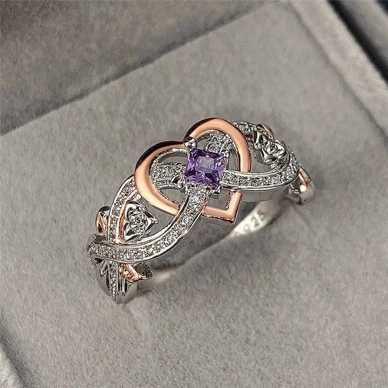 Huitan women's heart ring with romantic rose flower design and cubic zirconia, perfect for wedding or engagement jewelry.