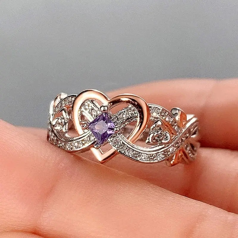 Huitan Women's Heart Ring with rose flower design and cubic zirconia, romantic wedding and engagement band in elegant jewelry style