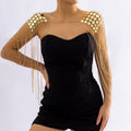 Gold metal chain shoulder body harness with sequins, tassels, and punk-inspired design for women, featuring stylish epaulette details.