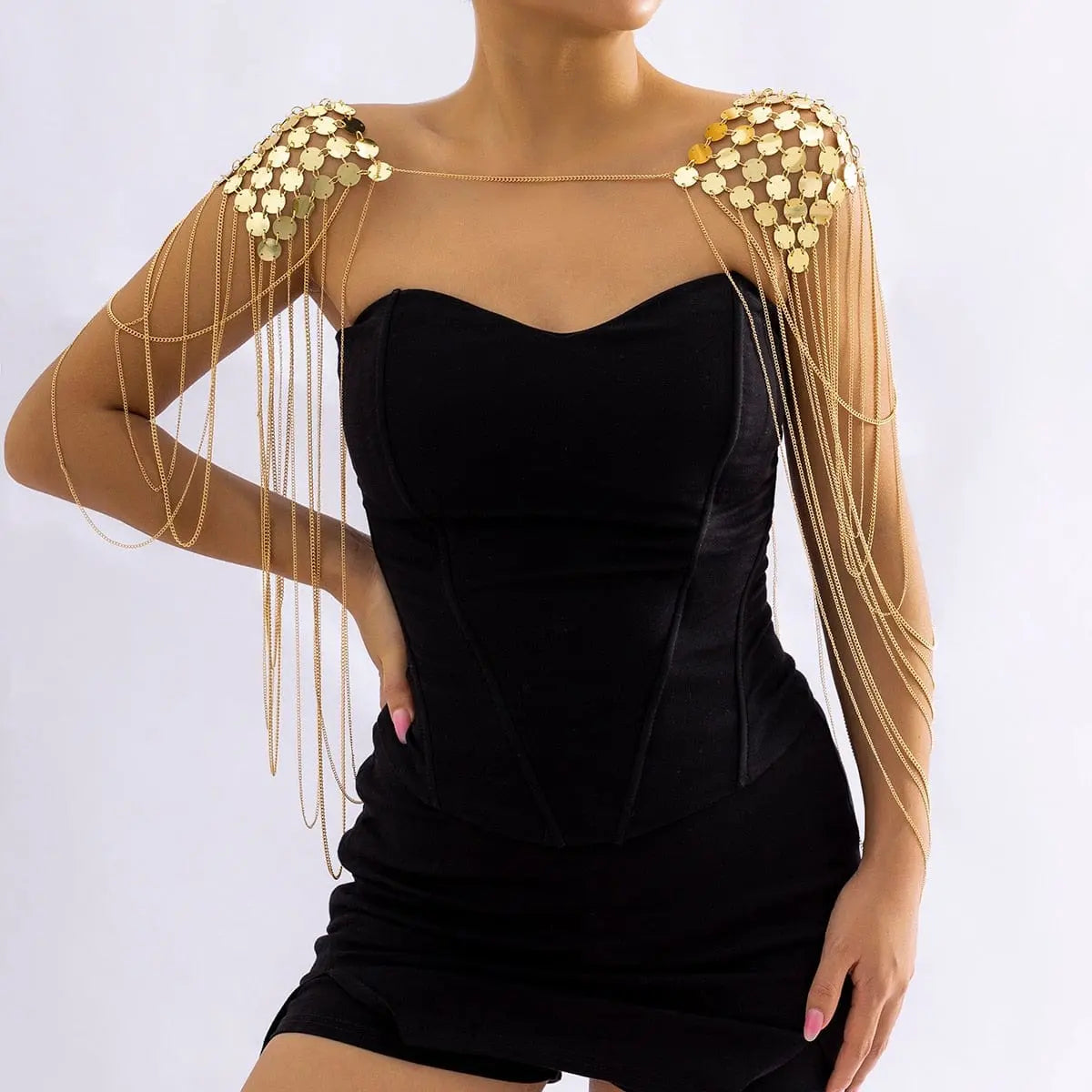 Gold metal chain shoulder body harness with sequins, tassels, and punk-inspired design for women, featuring stylish epaulette details.
