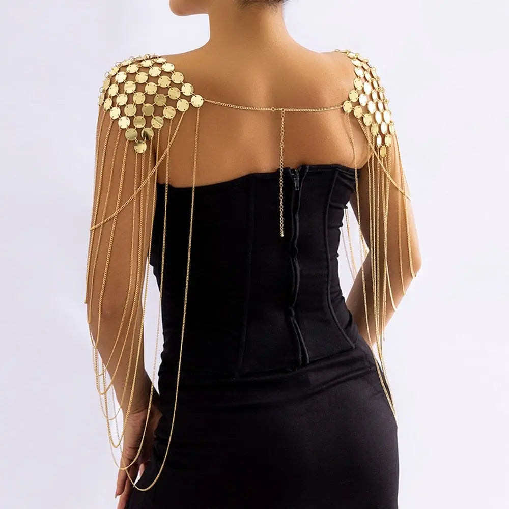 Gold metal shoulder body chain with sequin embellishments, designed for women, featuring a punk-inspired harness style.