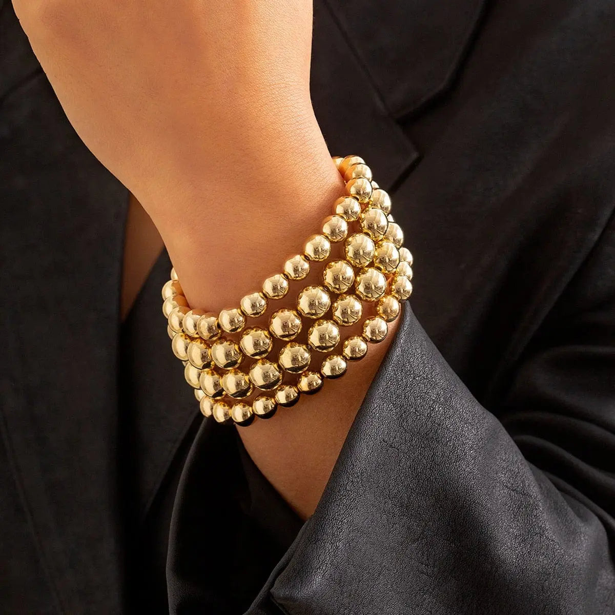 IngeSight.Z chunky multi-layered big ball choker necklace for women featuring thick plastic balls and layered design.