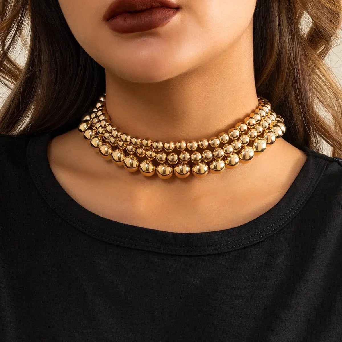 IngeSight.Z chunky multi-layered big ball choker necklace for women, featuring oversized plastic beads and thick layered design.