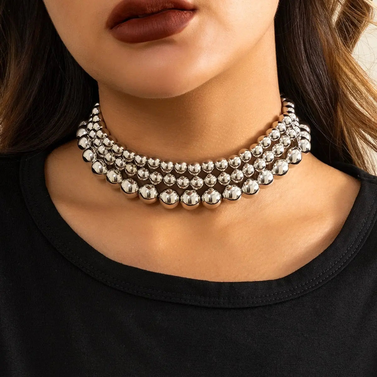 IngeSight.Z chunky multi-layered big ball choker necklace for women featuring thick plastic balls and layered design.