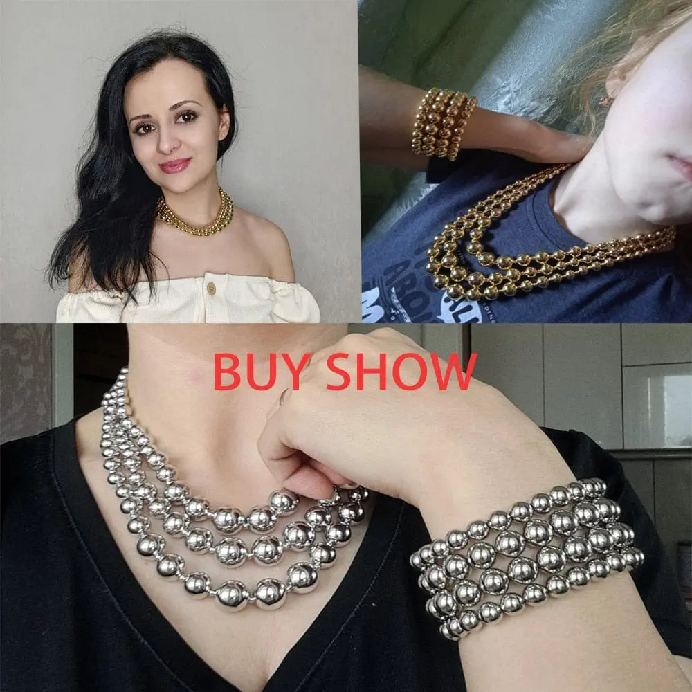 Vintage multi-layered chunky plastic ball choker necklace for women, featuring large oversized balls and bold style.
