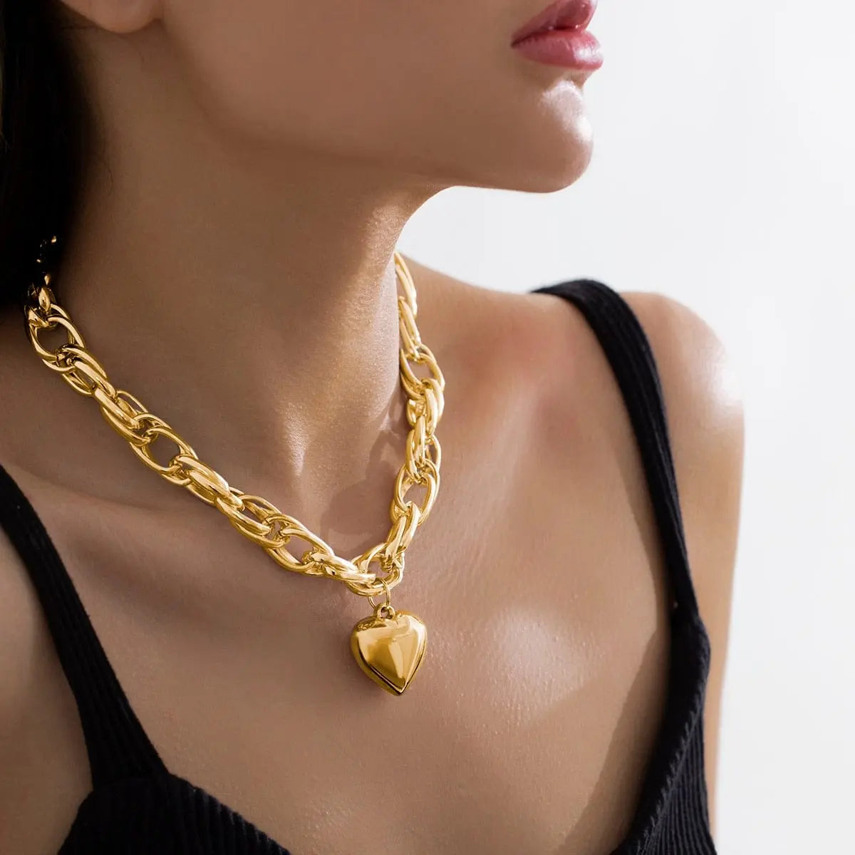 Ingemark punk big heart pendant necklace with a chunky heavy chain, bold statement jewelry for women and men.