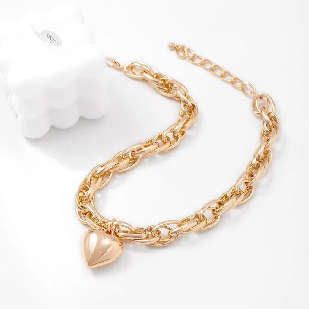 Ingemark punk heart pendant necklace with chunky heavy chain, bold statement jewelry, grunge steampunk style for women and men.