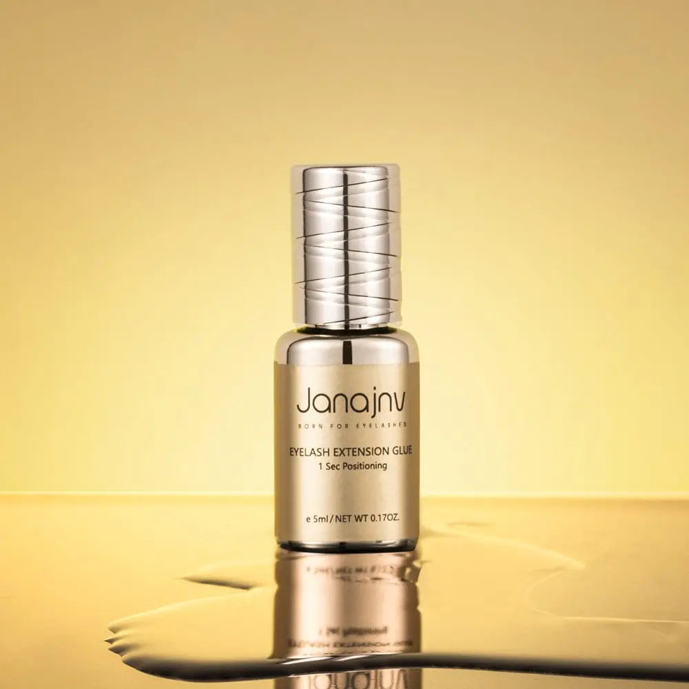 Janajnv hypoallergenic eyelash extension glue by Showlu Fashion Store, fast-drying, waterproof eyelash adhesive in a small bottle.
