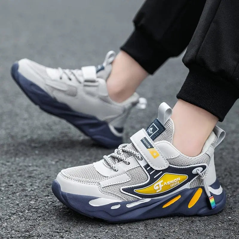 Kids' breathable mesh leather running sport shoes for boys and girls, showing casual and outdoor footwear by Showlu Fashion Store.