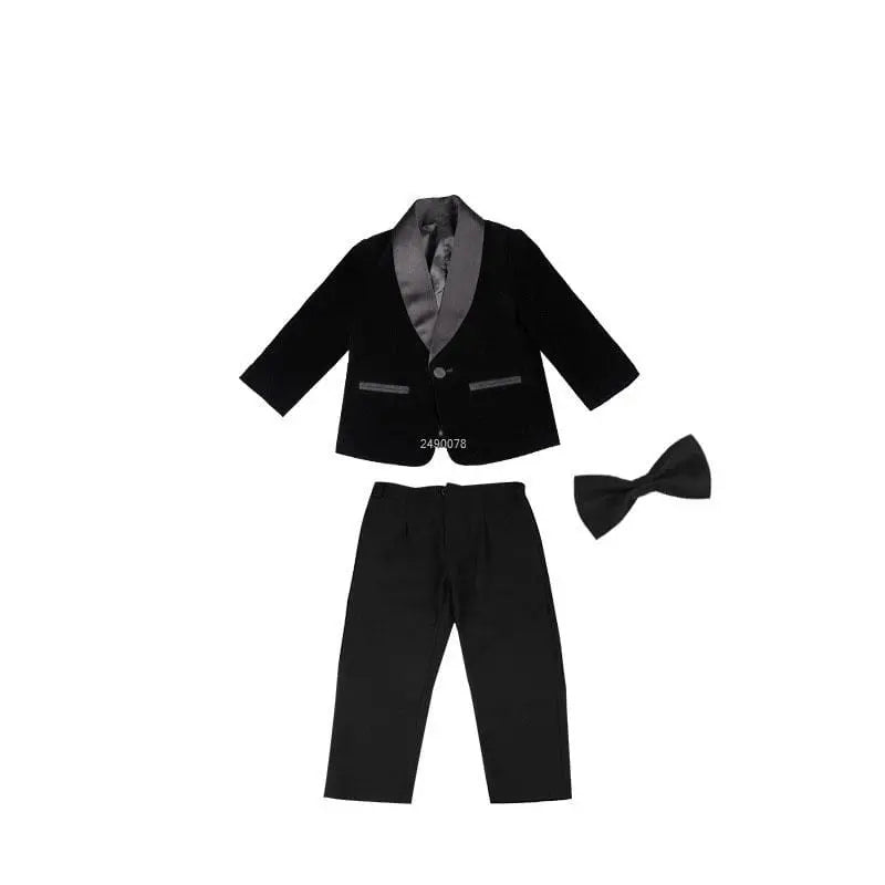 Kids green velvet blazer and pants suit by Showlu Fashion Store, perfect for boys' wedding parties and special events.