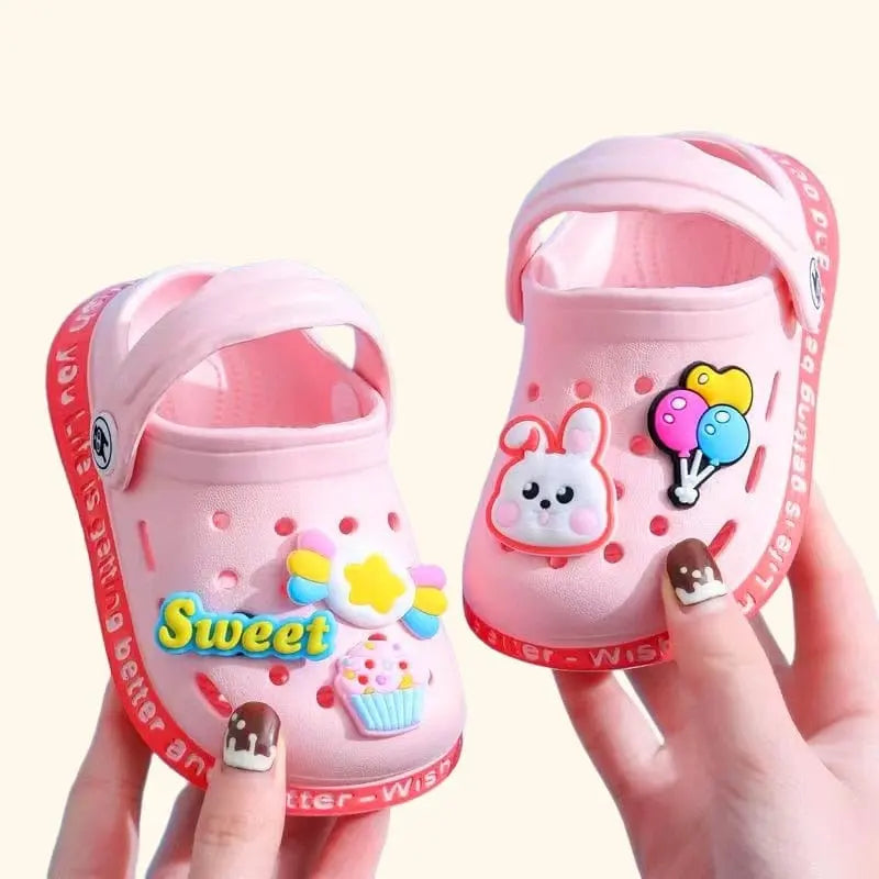 Kids cartoon hole sandals by Showlu Fashion Store, soft anti-skid EVA beach shoes for boys and girls with fun DIY cartoon design.