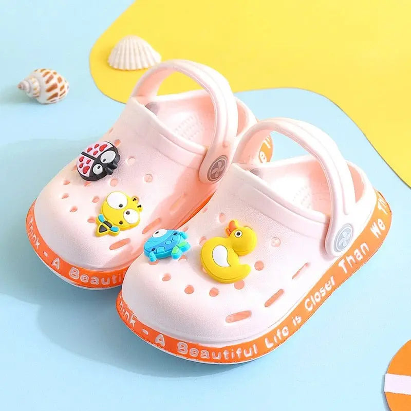 Kids cartoon hole sandals by Showlu Fashion Store, soft anti-skid EVA beach shoes for boys and girls with colorful fun design.