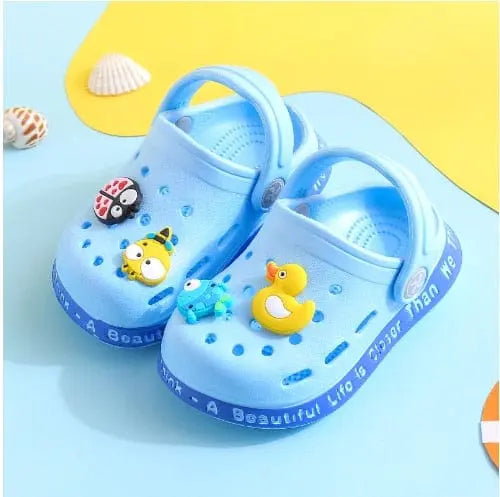 Kids cartoon hole sandals by Showlu Fashion Store, soft anti-skid EVA beach shoes for boys and girls, with colorful fun design.