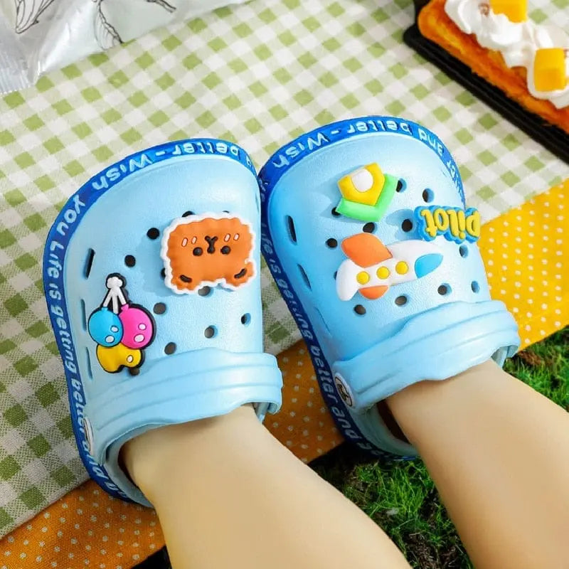 Kids cartoon hole sandals by Showlu Fashion Store, soft anti-skid EVA beach shoes for boys and girls, with colorful fun design.