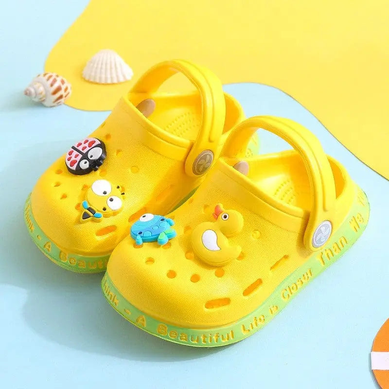 Kids cartoon hole sandals by Showlu Fashion Store, soft EVA beach shoes with anti-skid soles for boys and girls.