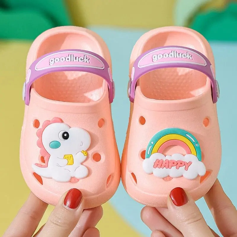 Kids cartoon hole sandals by Showlu Fashion Store, soft anti-skid EVA beach shoes for boys and girls, featuring colorful cartoon designs.