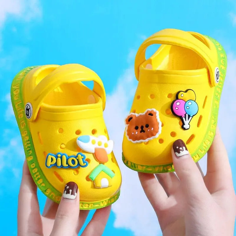 Kids cartoon hole sandals by Showlu Fashion Store, soft anti-skid EVA beach shoes for boys and girls, colorful and comfortable.